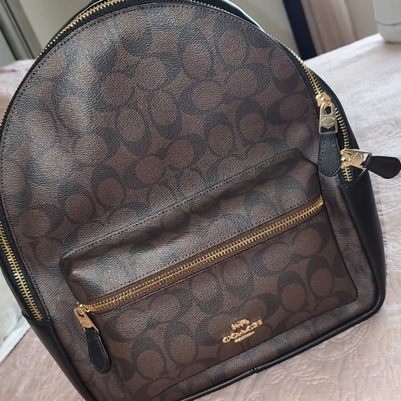 coach backpack 2020 West Pack Sling Bag 2540 Brown Pebble Leather Crossbody Fabric Lininghandle With 2 14 Drop Outside Zip Pocket Adjustable Shoulder Straps10 34 (L) X 12 12 (H) X 4 34 (W) Clark Backpack In Signature Camo